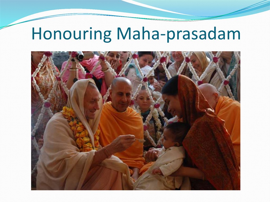 Honouring Maha-prasadam